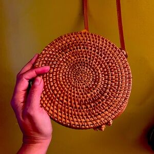 Urban Outfitters round hand-woven rattan  shoulder bag